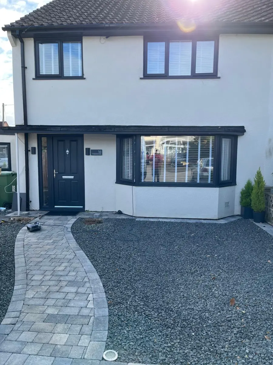 Property entrance before driveway and porch work